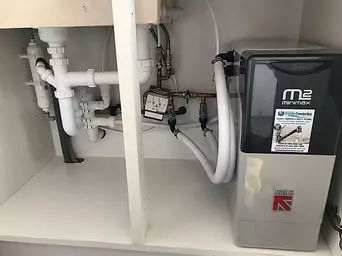 This Minimax block salt softener is installed with drinking water filter